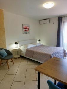 Postel nebo postele na pokoji v ubytování Casa Panorama Studio