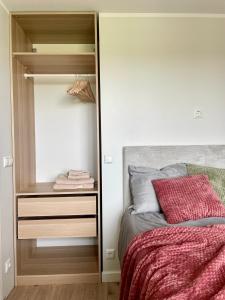 Ένα ή περισσότερα κρεβάτια σε δωμάτιο στο Seaview Sunrise Apartment