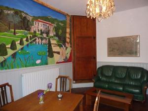 Χώρος καθιστικού στο Chambres d'Hôtes L'Enclos des Jacobins