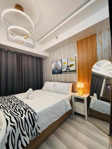 Voodi või voodid majutusasutuse Relax inn-Ts toas