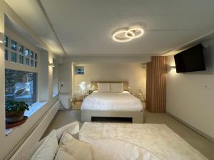 Een bed of bedden in een kamer bij B&B Villa Frisia