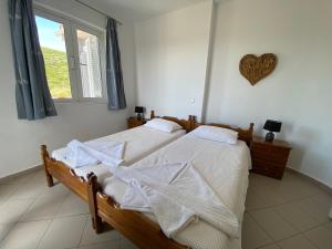 Voodi või voodid majutusasutuse Villa Karras toas