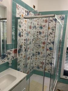 a shower in a bathroom with a sink at marella in Minori