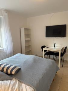 Postel nebo postele na pokoji v ubytování Guesthouse Hune