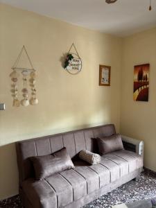A seating area at ''Mary's House'' Entire residence Olympiada Halkidiki Near to Sea 200m !