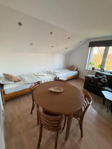 Posezení v ubytování Apartament Loft na Kaszubach - Laskowa Góra Bieszkowice