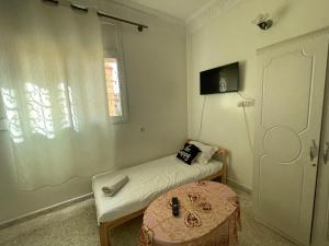 TV a/nebo společenská místnost v ubytování Hotel Maison Olga