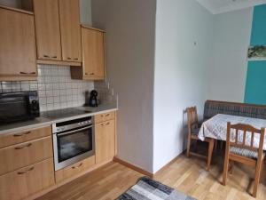 Η κουζίνα ή μικρή κουζίνα στο Villa Auszeit +10 φωτογραφίες