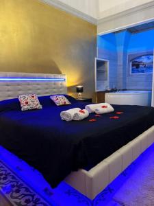 Postel nebo postele na pokoji v ubytování B&B ME Palace