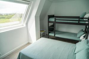 Posteľ alebo postele v izbe v ubytovaní H.A.N.D Surf Hostel