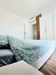 Postel nebo postele na pokoji v ubytování Nina