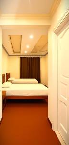 Aba-SHAH GUEST HOUSE SKARDU客房内的一张或多张床位