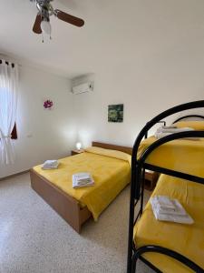 A bed or beds in a room at Villa Maria
