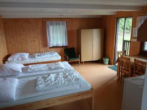 Postel nebo postele na pokoji v ubytování RS Lužnice
