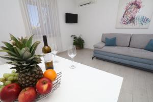 TV a/nebo společenská místnost v ubytování Mamma Mia Apartments