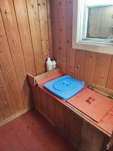 Postel nebo postele na pokoji v ubytování Bie huset