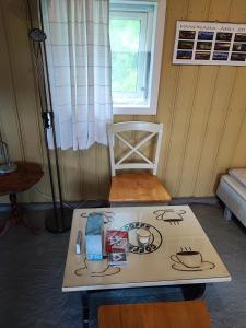 Postel nebo postele na pokoji v ubytování Bie huset
