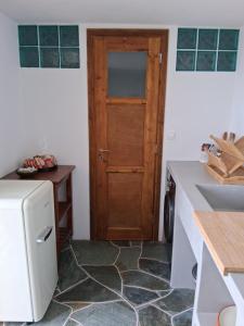 Kuchyň nebo kuchyňský kout v ubytování Madilida Sifnos Apartment