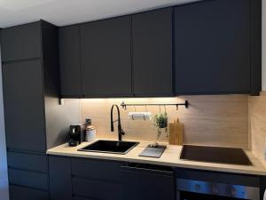 Η κουζίνα ή μικρή κουζίνα στο Nendaz Nest - Appartement moderne & confortable au cœur de Nendaz - 4 Vallées