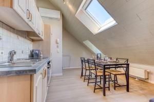 Una cocina o zona de cocina en Gite de Bier