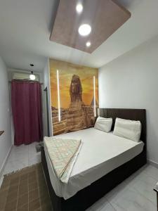 Postel nebo postele na pokoji v ubytování Pyramids Home Guest House