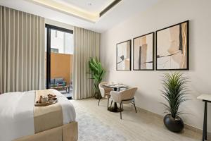 Postel nebo postele na pokoji v ubytování YamamaLiv - KAFD