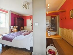 Postel nebo postele na pokoji v ubytování Villa Rhôna