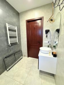 Koupelna v ubytování Devdaraki Apartments N 113 + 37 fotografií