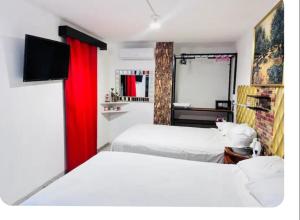 A bed or beds in a room at Otho mich