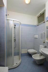 Ванная комната в Hotel Ristorante Commercio