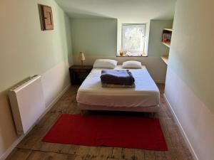 Postel nebo postele na pokoji v ubytování Confort et ressourcement au calme et au vert