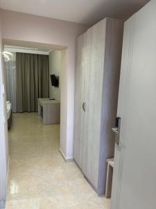 TV a/nebo společenská místnost v ubytování Hotel Miami Beach
