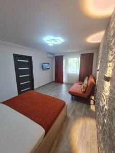 Ένα ή περισσότερα κρεβάτια σε δωμάτιο στο Apartament modern Metrou Titan - Miniș