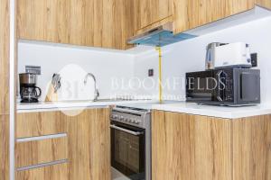 Kuchyň nebo kuchyňský kout v ubytování Bloomfields Elegant 1Br in Al Maryah Island + 4 fotografie