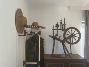 a room with some weapons on a wall at OK Sakhli VIP in Shekhvetili