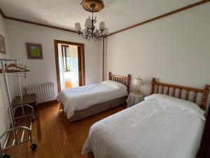 Postel nebo postele na pokoji v ubytování La Casa de la Carpintería