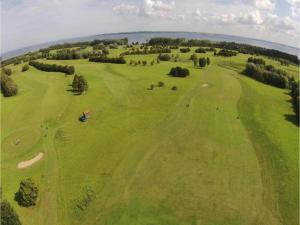 an overhead view of a golf course with a green field at Bungalow in Damshagen nahe der Ostsee in Reppenhagen