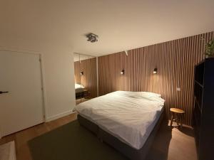 Ένα ή περισσότερα κρεβάτια σε δωμάτιο στο Stolp & Stay