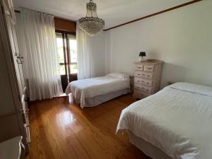 Postel nebo postele na pokoji v ubytování La Casa de la Carpintería