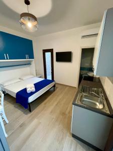 Kuchyň nebo kuchyňský kout v ubytování Sant Isidoro Apartments