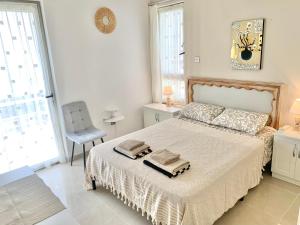Postel nebo postele na pokoji v ubytování Boho Bay Apartment