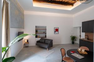 Posezení v ubytování Residenza boutique Portici 29 II