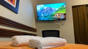 TV a/nebo společenská místnost v ubytování Posada Miraflores