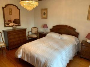 Postel nebo postele na pokoji v ubytování La Casa de la Carpintería