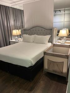Letto o letti in una camera di Flat Higienópolis Com Varanda