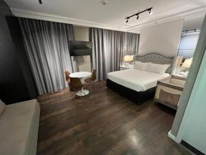 Letto o letti in una camera di Flat Higienópolis Com Varanda