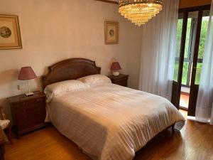 Postel nebo postele na pokoji v ubytování La Casa de la Carpintería
