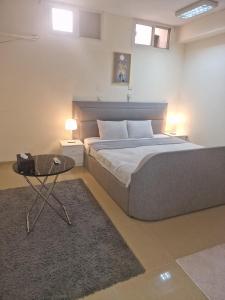 Krevet ili kreveti u jedinici u okviru objekta Basement Apartments