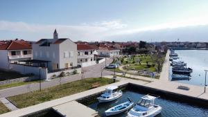 a group of boats are docked in a marina at Apartment Anastazija in Nin