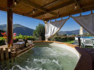 a large swimming pool in a house with at Yurta con uso piscina e vista meravigliosa in Dicomano